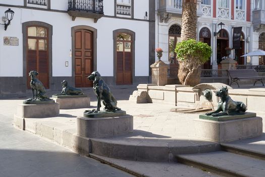 Las Palmas de Gran Canaria, Spain - September 18, 2022: Iron canarian dogs statues on Plaza Santa Ana, modelled after the Canarian hounds that were originally on the island when the Spanish settled.