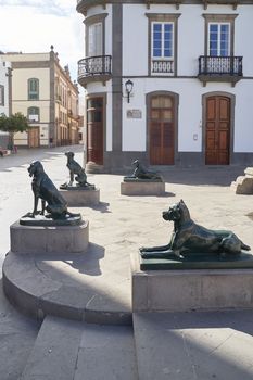 Las Palmas de Gran Canaria, Spain - September 18, 2022: Iron canarian dogs statues on Plaza Santa Ana, modelled after the Canarian hounds that were originally on the island when the Spanish settled.