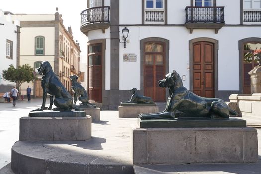 Las Palmas de Gran Canaria, Spain - September 18, 2022: Iron canarian dogs statues on Plaza Santa Ana, modelled after the Canarian hounds that were originally on the island when the Spanish settled.
