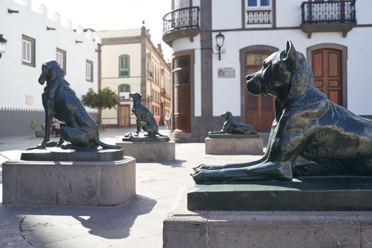 Las Palmas de Gran Canaria, Spain - September 18, 2022: Iron canarian dogs statues on Plaza Santa Ana, modelled after the Canarian hounds that were originally on the island when the Spanish settled.