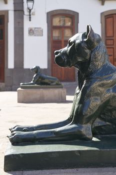 Las Palmas de Gran Canaria, Spain - September 18, 2022: Iron canarian dogs statues on Plaza Santa Ana, modelled after the Canarian hounds that were originally on the island when the Spanish settled.