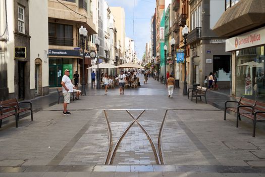 Las Palmas de Gran Canaria, Spain - September 18, 2022: Old train rails at the main shopping street Calle Triana