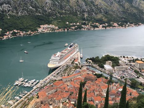 Views overlooking the city streets and waterfront of Kotor Montenegro in a european summer. High quality photo