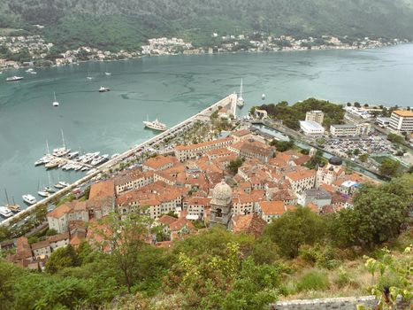 Views overlooking the city streets and waterfront of Kotor Montenegro in a european summer. High quality photo