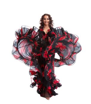 Woman dance in gypsy red and black costume isolated