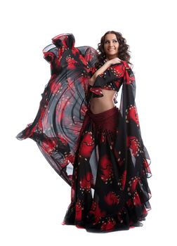 Woman dance in gypsy red and black costume isolated