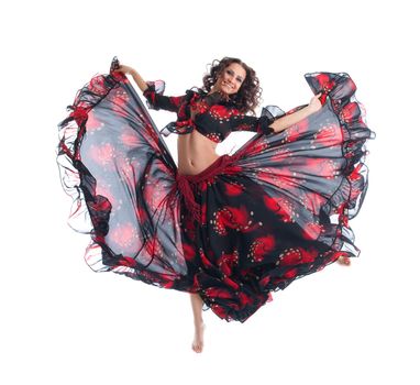 young Beauty woman jump in gypsy dance isolated