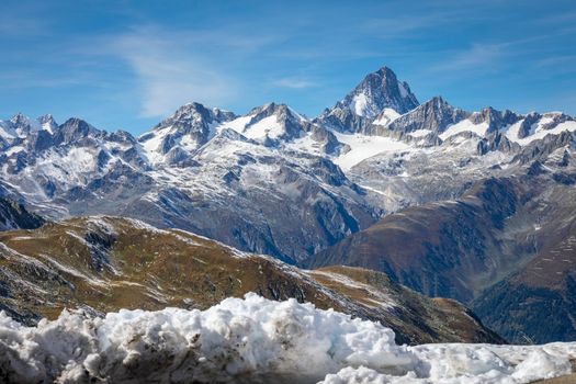Dramatic snowcapped Bernese swiss alps seen from Nufenen Pass, Switzerland