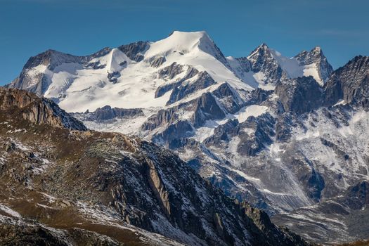 Dramatic snowcapped Bernese swiss alps seen from Nufenen Pass, Switzerland
