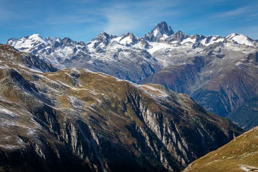 Dramatic snowcapped Bernese swiss alps seen from Nufenen Pass, Switzerland