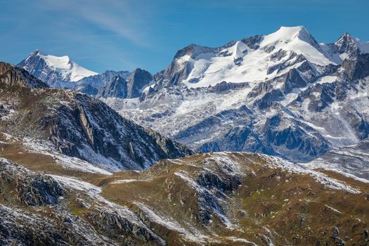 Dramatic snowcapped Bernese swiss alps seen from Nufenen Pass, Switzerland
