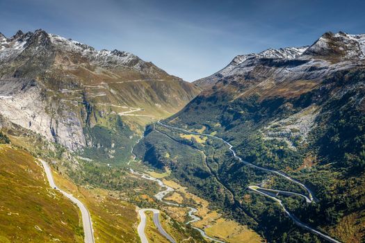 Grimsel and Furka mountain pass, dramatic road with swiss alps at sunny day, Switzerland