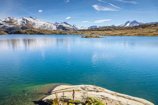 Alpine Lake at Oberalp Pass in Graubunden swiss alps, Grisons, Switzerland