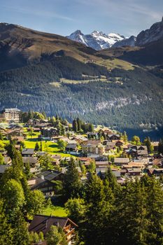 View of Snowcapped Bernese Swiss alps and Murren village, Switzerland