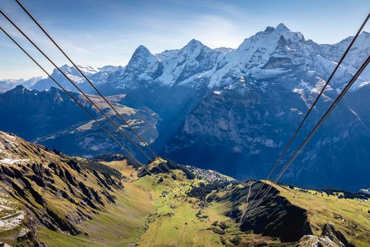 Top of the Schilthorn and view of Snowcapped Bernese Swiss alps, panorama of Eiger, Monch and Jungfrau, Switzerland