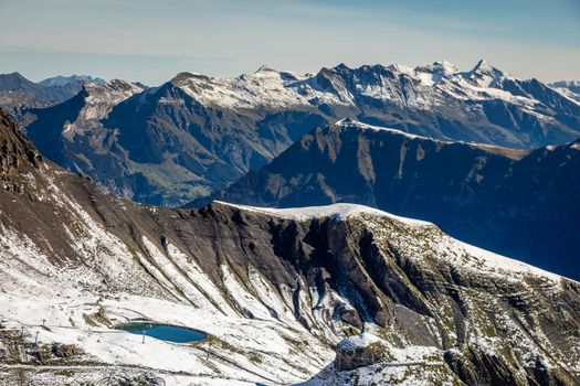 Top of the Schilthorn and view of Snowcapped Bernese Swiss alps, panorama of Eiger, Monch and Jungfrau, Switzerland
