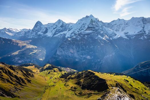Top of the Schilthorn and view of Snowcapped Bernese Swiss alps, panorama of Eiger, Monch and Jungfrau, Switzerland