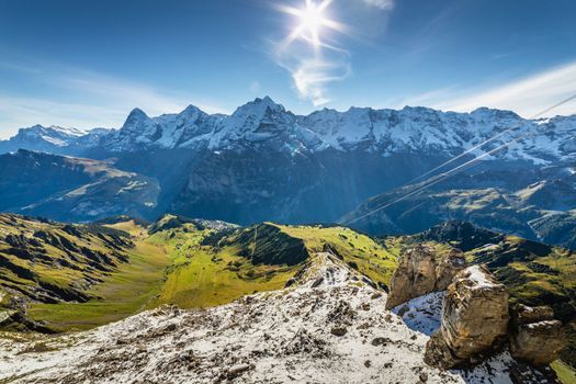 Top of the Schilthorn and view of Snowcapped Bernese Swiss alps, panorama of Eiger, Monch and Jungfrau, Switzerland