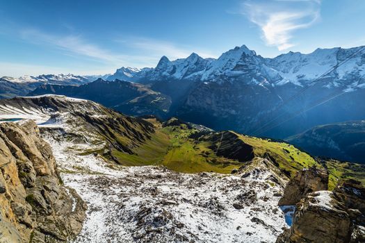 Top of the Schilthorn and view of Snowcapped Bernese Swiss alps, panorama of Eiger, Monch and Jungfrau, Switzerland