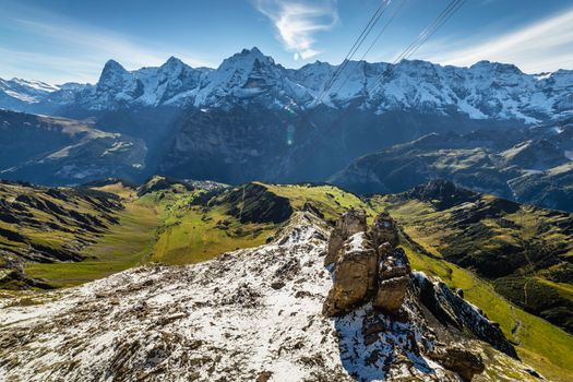 Top of the Schilthorn and view of Snowcapped Bernese Swiss alps, panorama of Eiger, Monch and Jungfrau, Switzerland