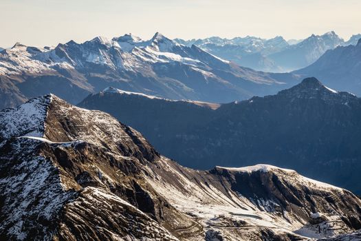 Top of the Schilthorn and view of Snowcapped Bernese Swiss alps, panorama of Eiger, Monch and Jungfrau, Switzerland