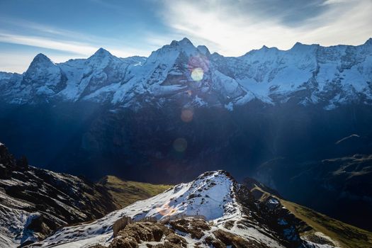Top of the Schilthorn and view of Snowcapped Bernese Swiss alps, panorama of Eiger, Monch and Jungfrau, Switzerland