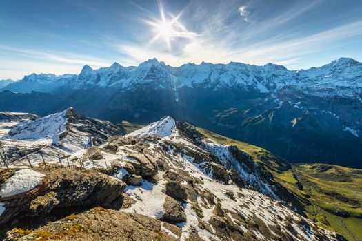 Top of the Schilthorn and view of Snowcapped Bernese Swiss alps, panorama of Eiger, Monch and Jungfrau, Switzerland