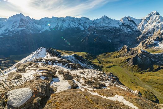 Top of the Schilthorn and view of Snowcapped Bernese Swiss alps, panorama of Eiger, Monch and Jungfrau, Switzerland