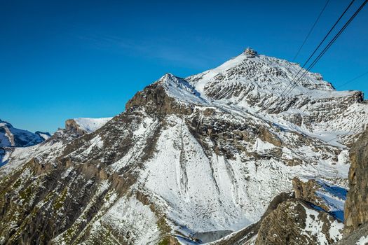 Top of the Schilthorn and view of Snowcapped Bernese Swiss alps, panorama of Eiger, Monch and Jungfrau, Switzerland