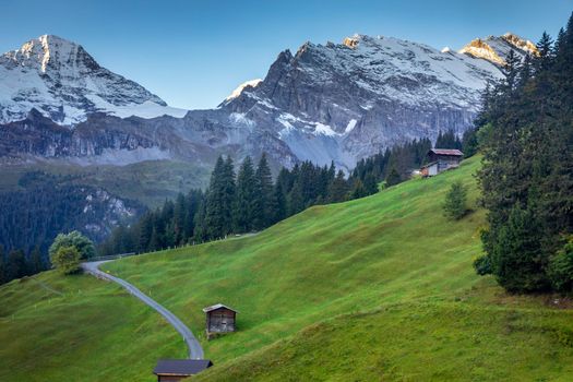Top of the Schilthorn and view of Snowcapped Bernese Swiss alps and alpine farms, Switzerland