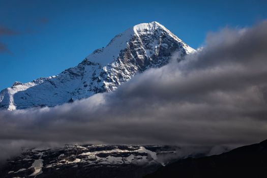 Misty Eiger Mountain, Snowcapped Bernese Swiss alps, view from Schynige Platte, Switzerland