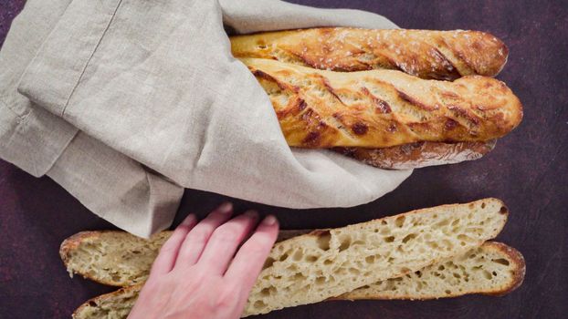Flat lay. Freshly baked homemade French baguette bread.
