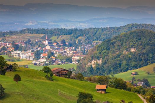 Idyllic landscape of Preda village in Engadine valley at springtime sunset, Swiss Alps, Switzerland