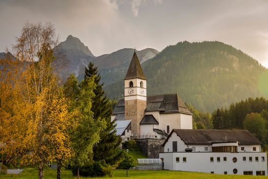Idyllic landscape of Scuol Tarasp village at sunrise, Engadine, Swiss Alps, Switzerland