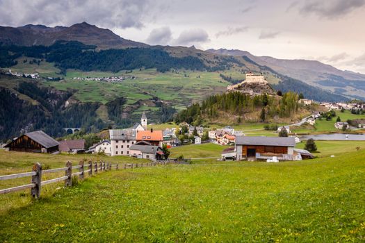 Idyllic landscape of Scuol Tarasp village at sunrise, Engadine, Swiss Alps, Switzerland