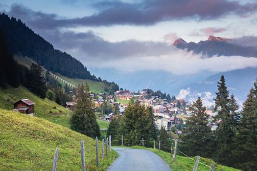 View of Snowcapped Bernese Swiss alps and Murren village, Switzerland