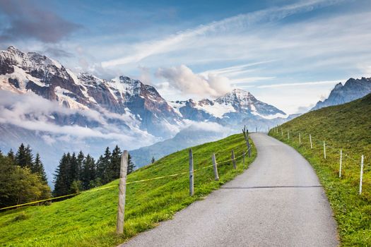 View of Snowcapped Bernese Swiss alps and mountain road in Murren , Switzerland