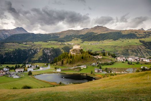 Idyllic landscape of Scuol Tarasp village at sunrise, Engadine, Swiss Alps, Switzerland