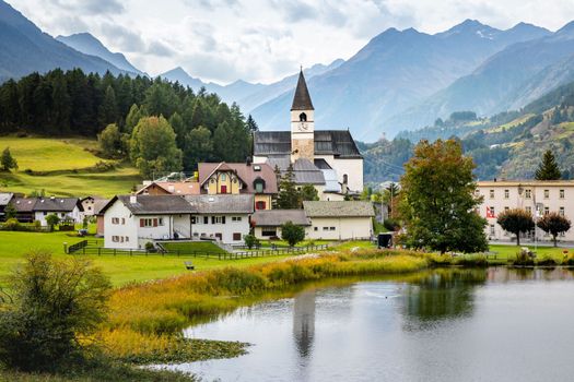 Idyllic landscape of Scuol Tarasp village at sunrise, Engadine, Swiss Alps, Switzerland