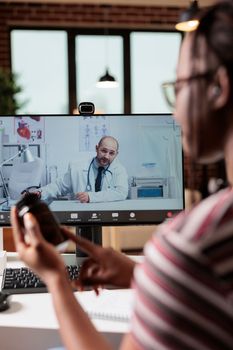 Online medical consultation, patient discussing prescripted pills with doctor on video call. Telemedicine, remote therapist appointment, live communication with gp on computer at home