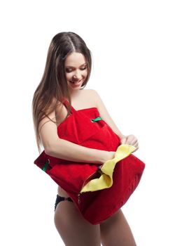 Woman with long hair take towel from red beach bag isolated