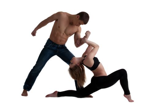 Couple of young gymnast posing in dance performance isolated