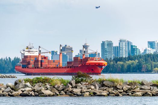 Container cargo liner in Vancouver harbor going fairway.