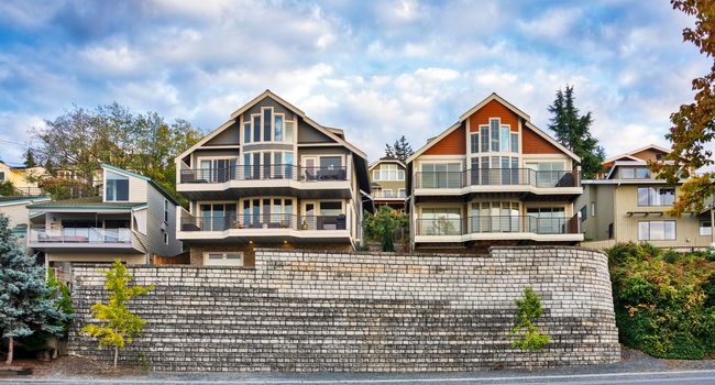 Residential houses on the land terrace fortified with the retention wall.