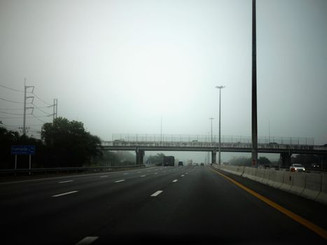 Road in the fog, sign mention keep distance for Motorway-t7.svg THAILAND