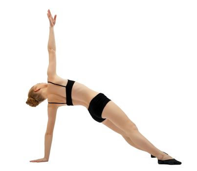 Young girl in dance cloth training on white isolated