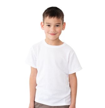 T shirt mock up. Cute little boy in blank white t-shirt isolated on a white background.