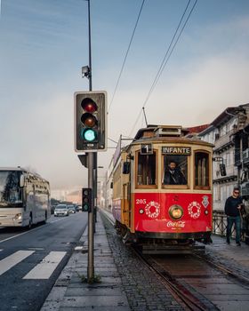 Porto, Portugal - January 9, 2023: Red tram in Porto city.