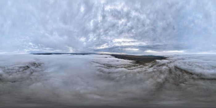 Sky part of a seamless panorama with light clouds, a spherical panorama from a drone as a sky dome.