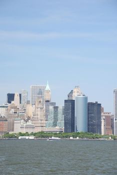 building and skyline of downtown manhattan during daytime as seen from a boat